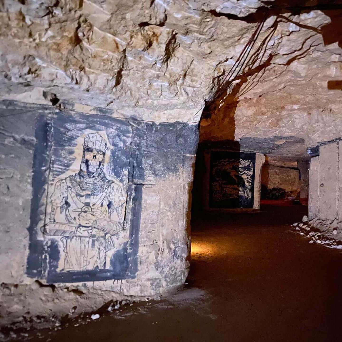 Historische muurschildering in de grotten van Valkenburg